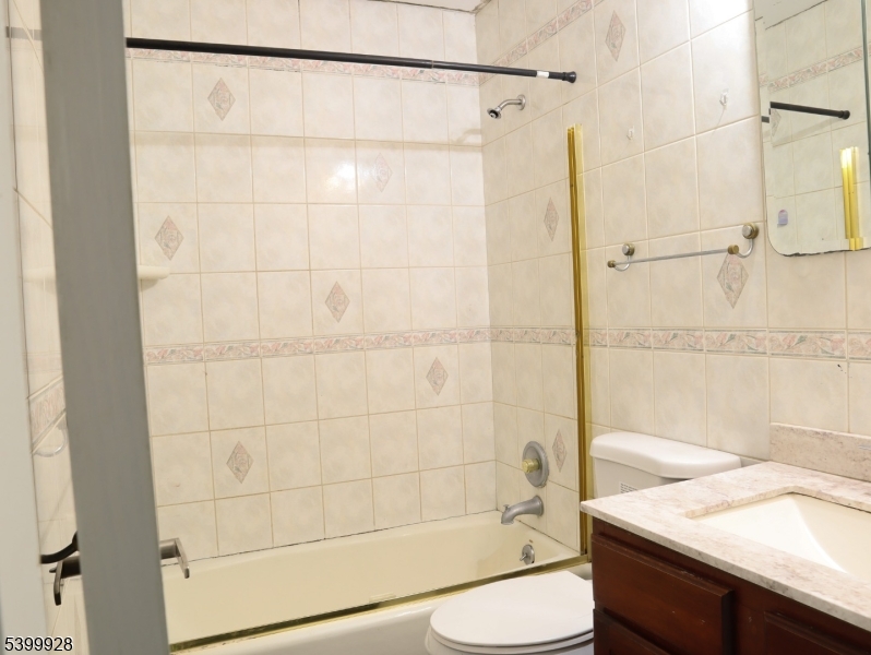 167 Marne Road Hopatcong, NJ 07843 - Photo 13 of 16 a bathroom with a sink and a shower