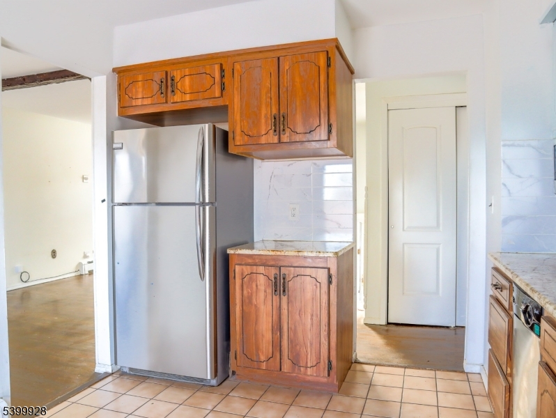 167 Marne Road Hopatcong, NJ 07843 - Photo 15 of 16 a utility room with refrigerator and washer