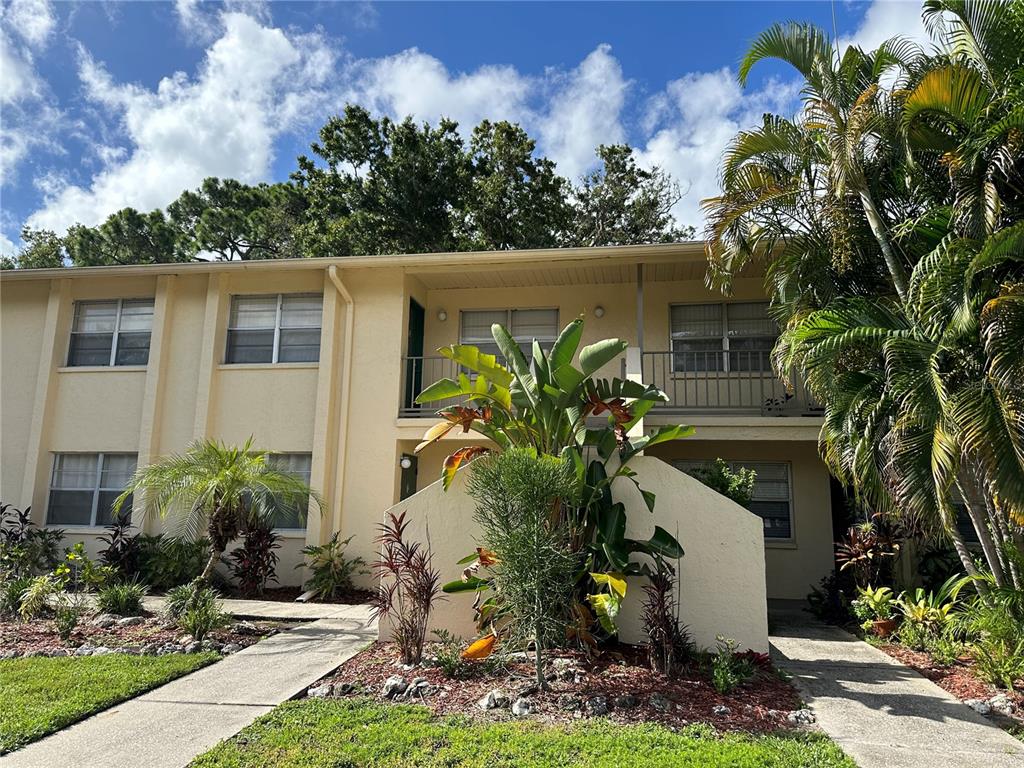 a house with a flower garden