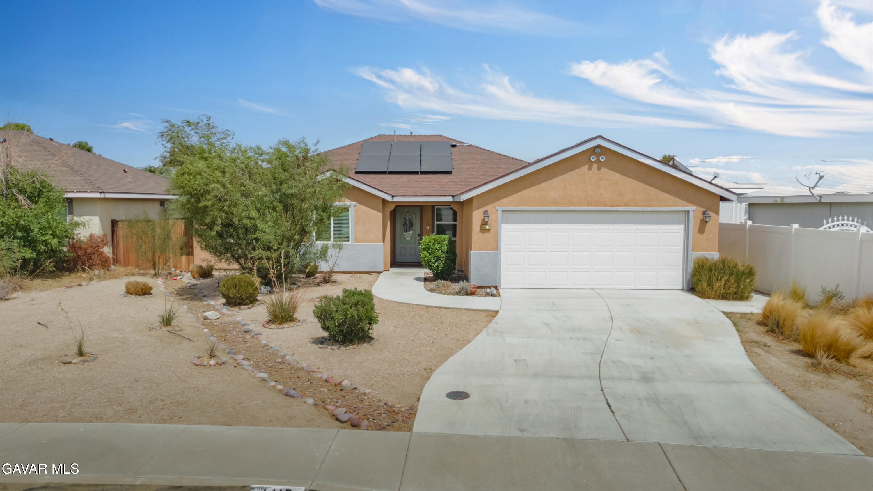 1415 Richfield Avenue Rosamond, CA 93560 - Photo 1 of 21 front view of a house with potted plants
