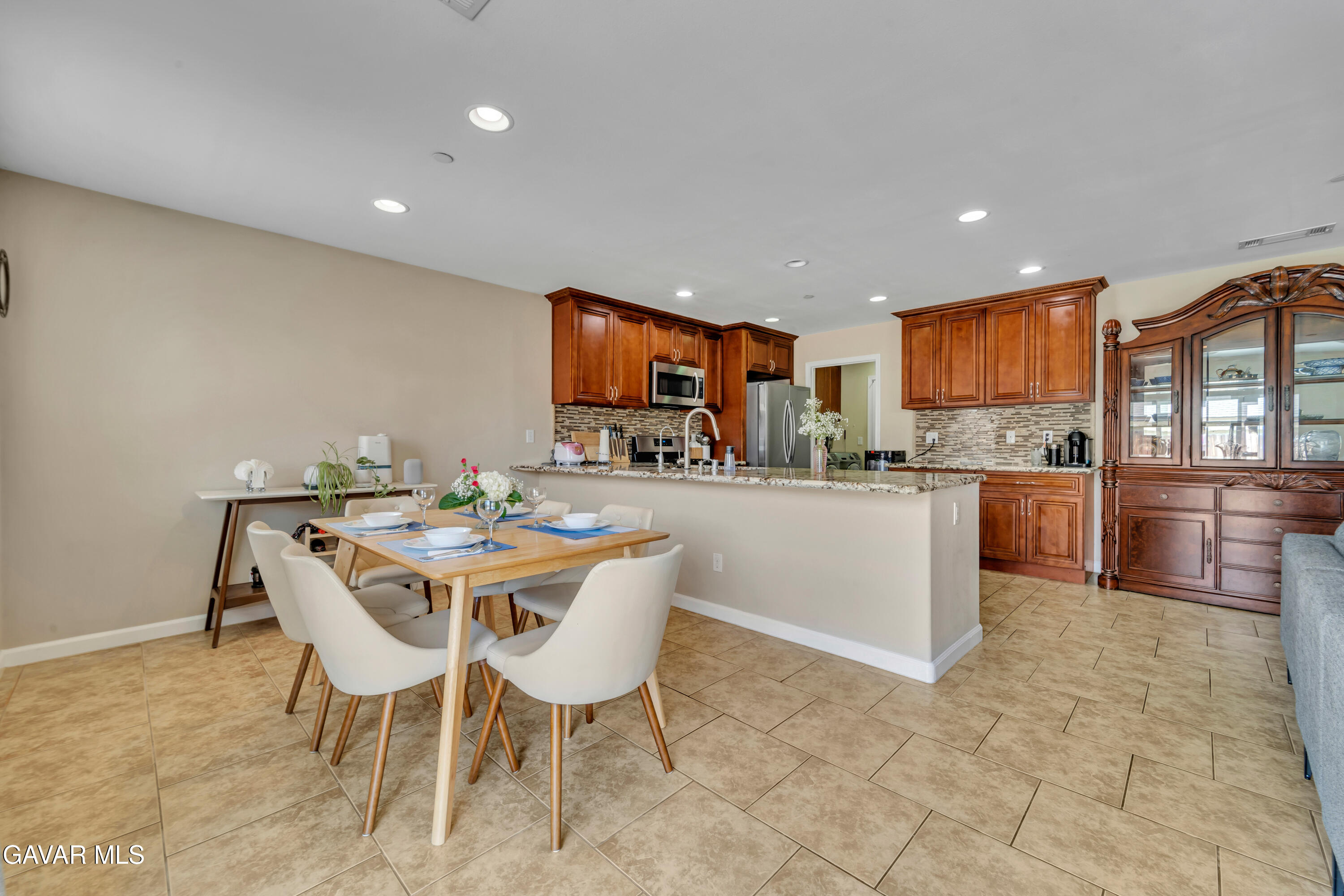 1415 Richfield Avenue Rosamond, CA 93560 - Photo 6 of 21 a kitchen with a table and chairs in it