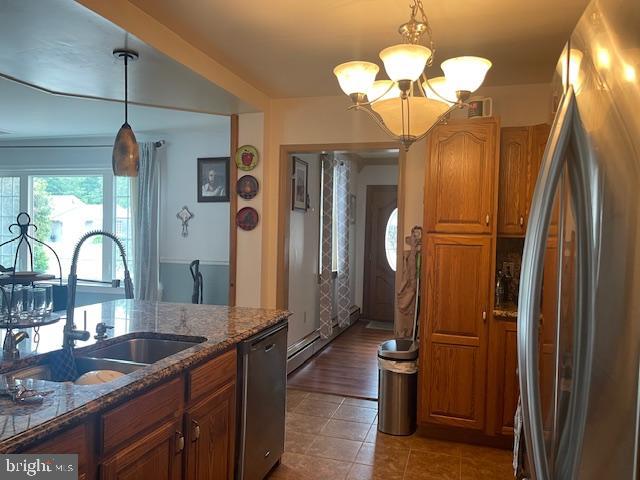 51 Washington Avenue Carneys Point, NJ 08069 - Photo 22 of 63 a kitchen with stainless steel appliances granite countertop a sink a stove and refrigerator