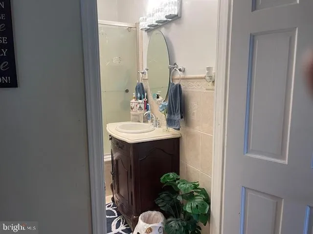 a view of a wooden deck and a backyard with slide