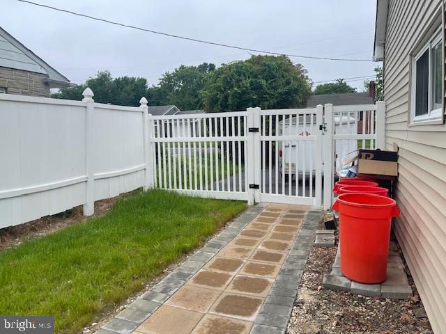 51 Washington Avenue Carneys Point, NJ 08069 - Photo 38 of 63 a view of a chair and table on the wooden deck