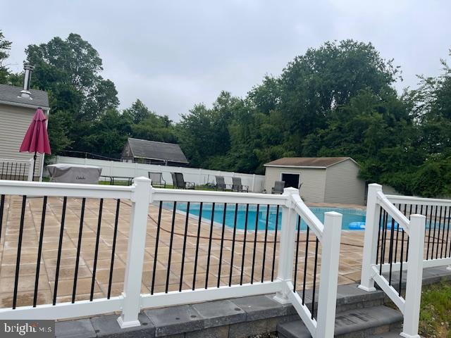 51 Washington Avenue Carneys Point, NJ 08069 - Photo 41 of 63 a view of a wooden deck and a backyard with slide
