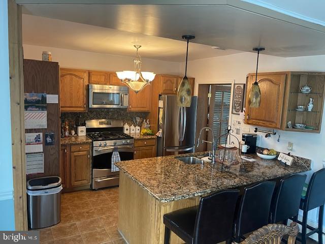 51 Washington Avenue Carneys Point, NJ 08069 - Photo 46 of 63 a kitchen with a sink stove and refrigerator