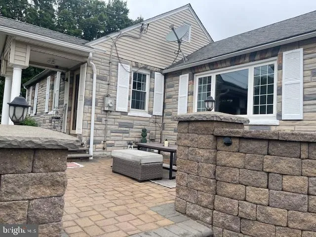 a view of a house with lounge chair