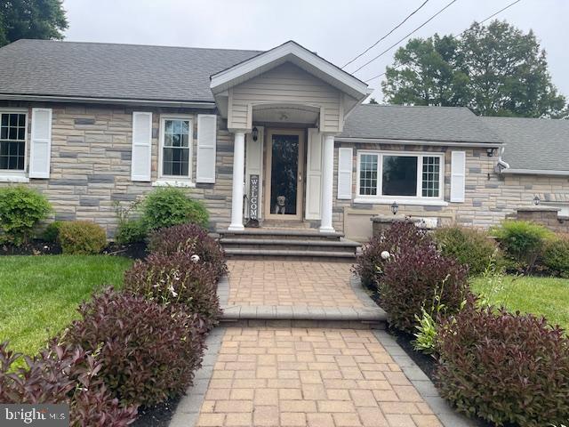 51 Washington Avenue Carneys Point, NJ 08069 - Photo 10 of 63 a front view of house with yard and green space