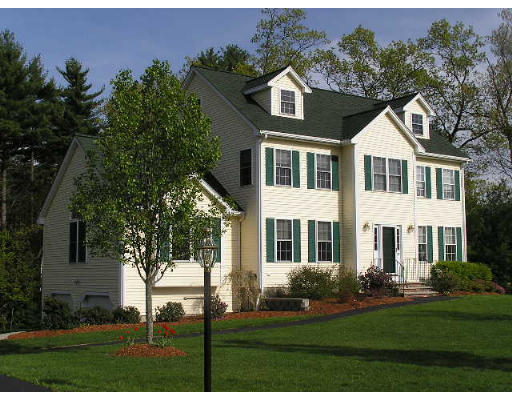 21 Simonds Farm Road Billerica, MA 01862 - Photo 1 of 16 a front view of a house with a yard