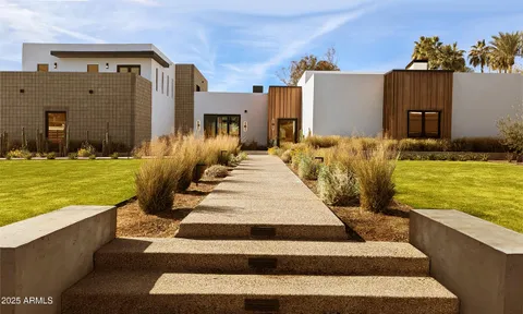 a view of swimming pool with outdoor seating