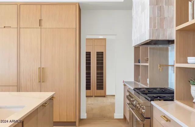 a room with furniture and a large window