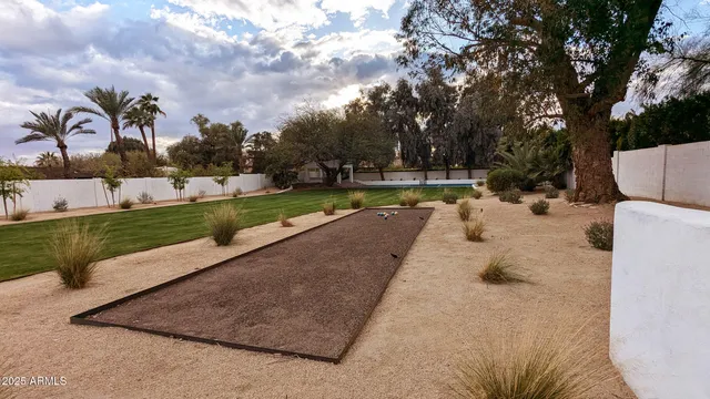 an aerial view of residential houses and outdoor space