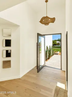 a view of an entryway with a kitchen