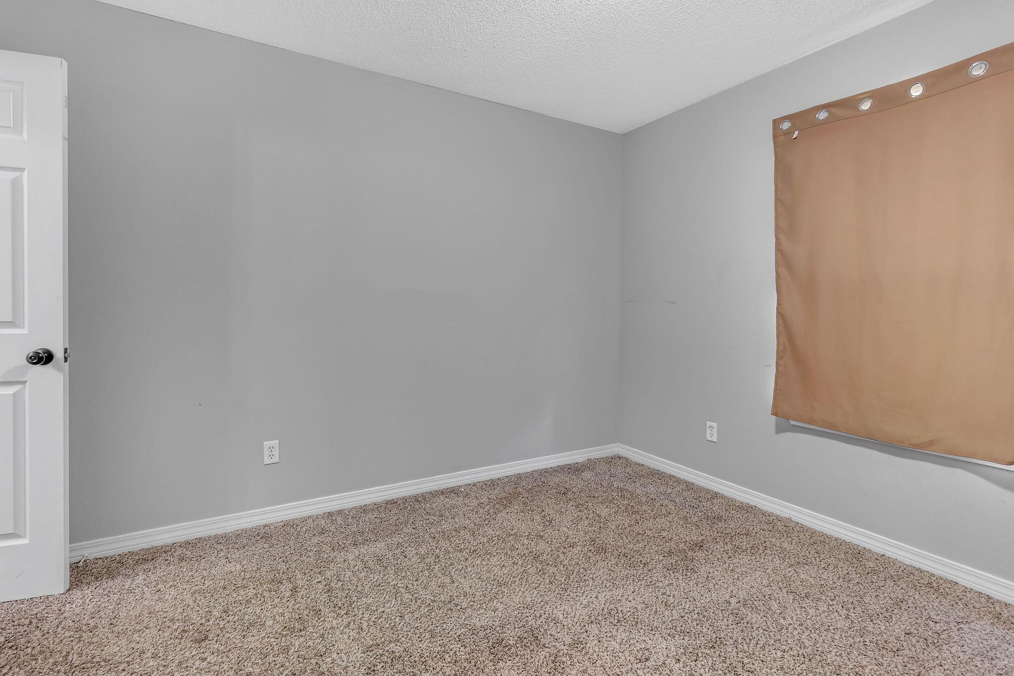 205 Trish Drive Crestview, FL 32536 - Photo 24 of 32 a room that has a window in it