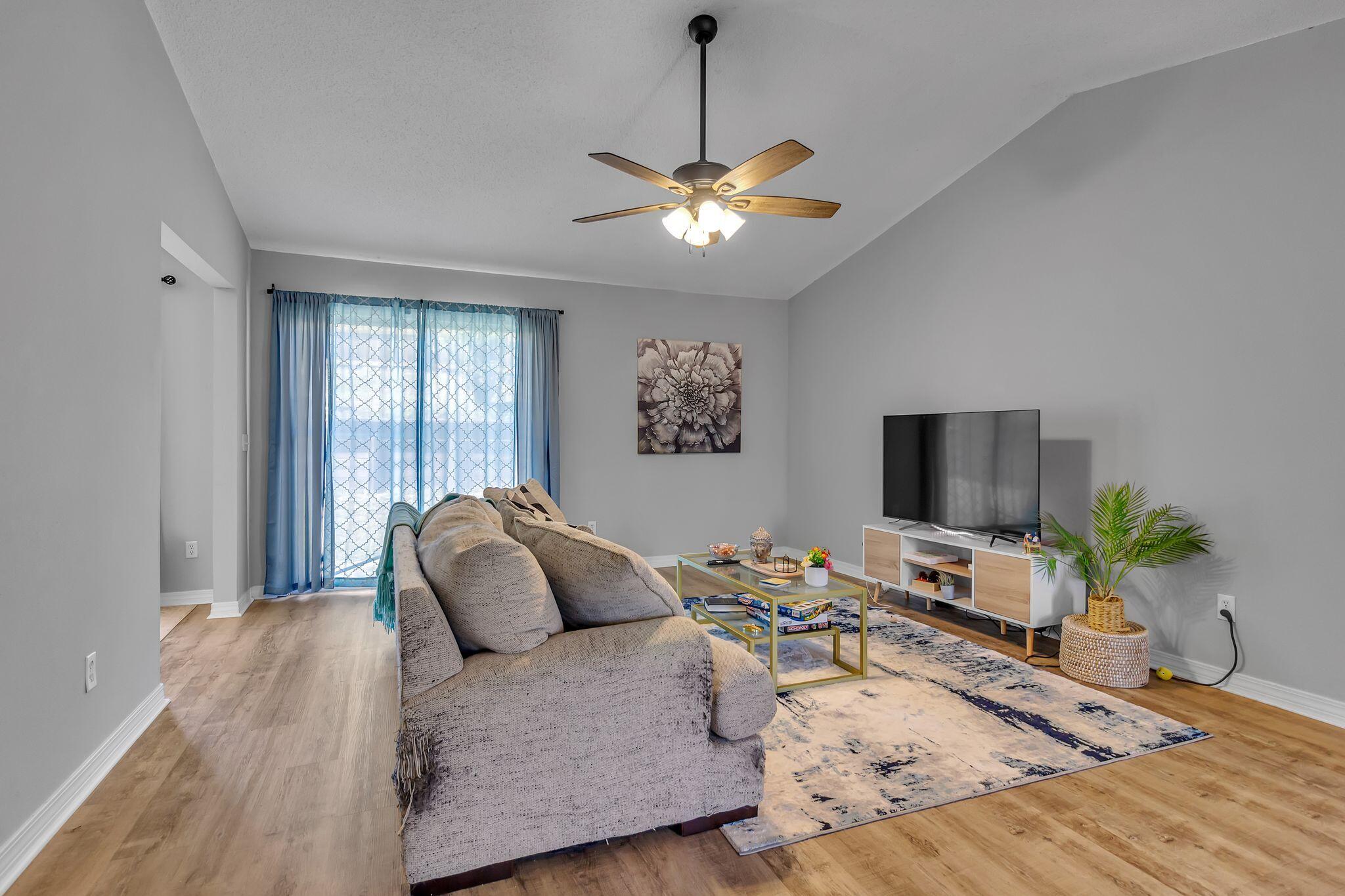 205 Trish Drive Crestview, FL 32536 - Photo 5 of 32 a living room with furniture and a flat screen tv