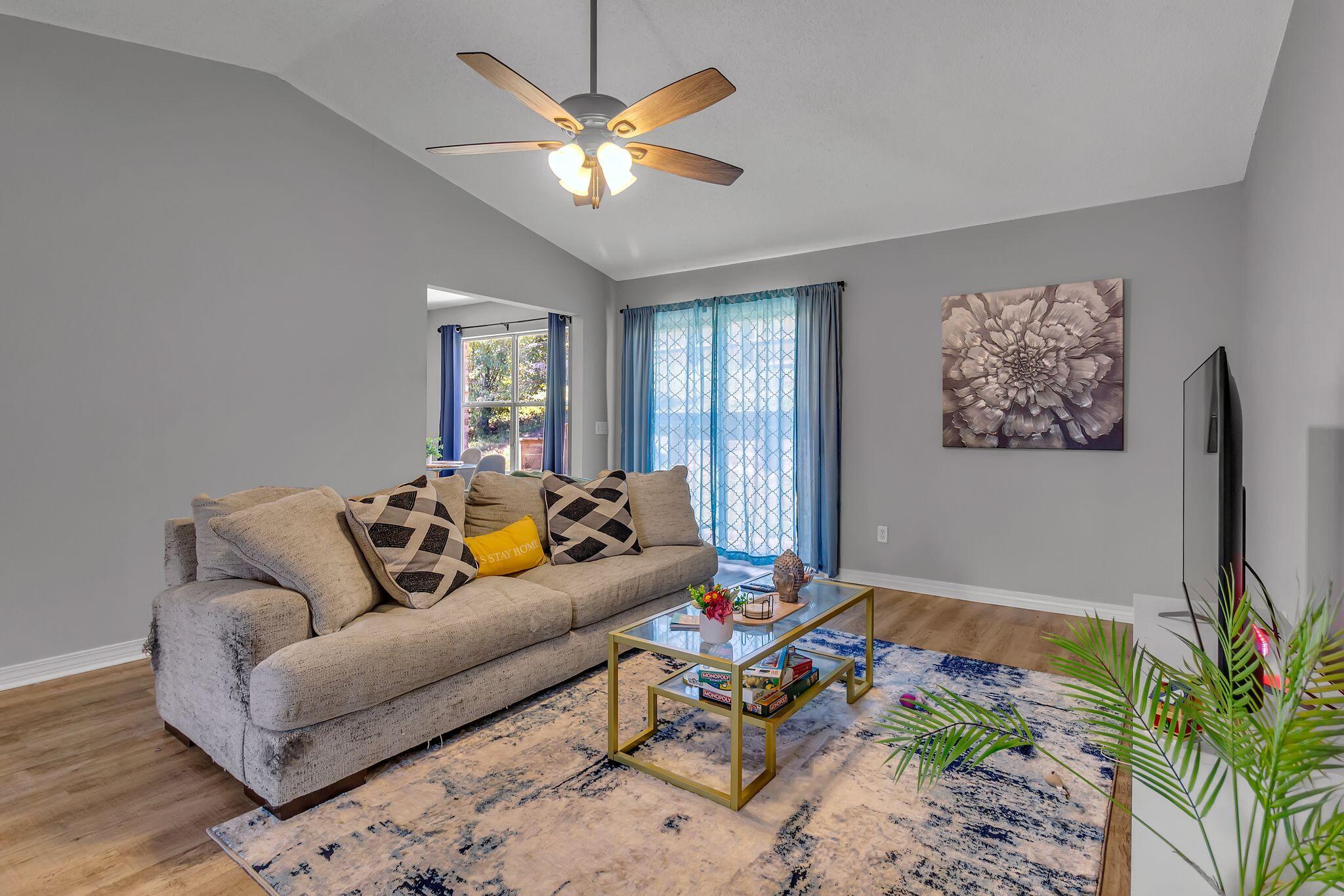 205 Trish Drive Crestview, FL 32536 - Photo 6 of 32 a living room with furniture rug and a window