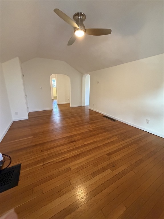 42 Fairview Street, Unit 42 Boston, MA 02131 - Photo 4 of 18 a view of empty room with wooden floor and fan