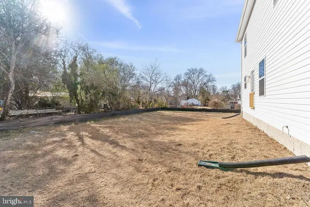 a view of a street with a house