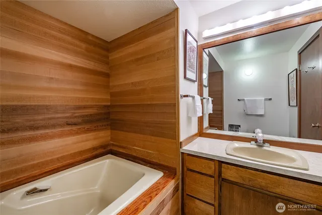 a bathroom with a sink and a bathtub