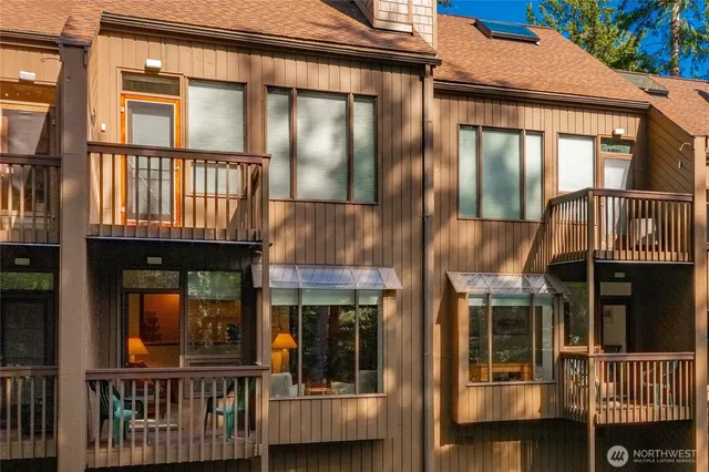 a front view of a building with glass windows