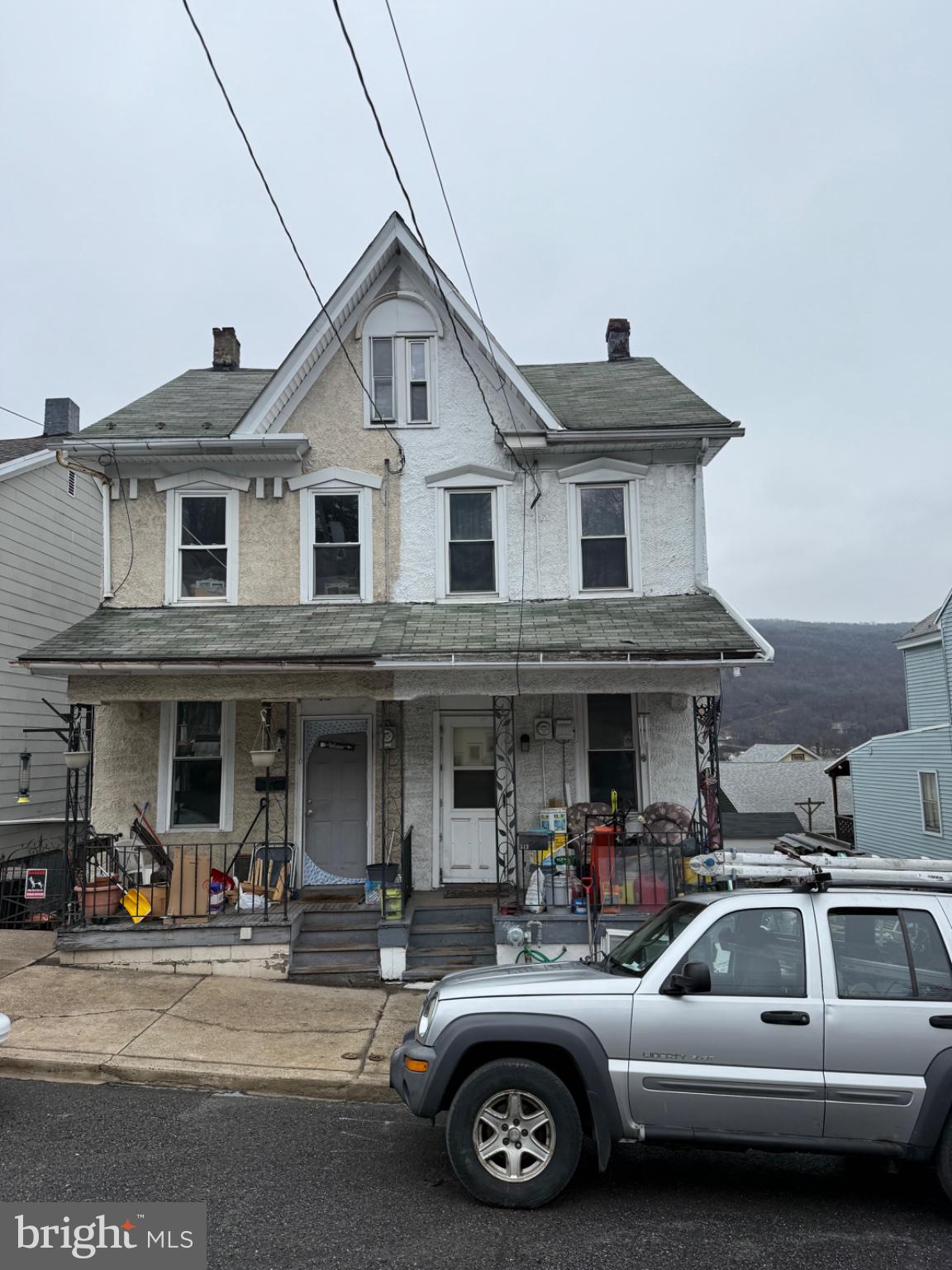 4685 Upper Road Shamokin, PA 17872 - Photo 12 of 12 a view of a car parked in front of a house