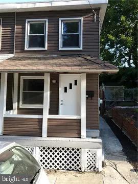 4685 Upper Road Shamokin, PA 17872 - Photo 2 of 12 a front view of a house with a yard