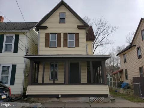 4685 Upper Road Shamokin, PA 17872 - Photo 3 of 12 a front view of a house with a tree