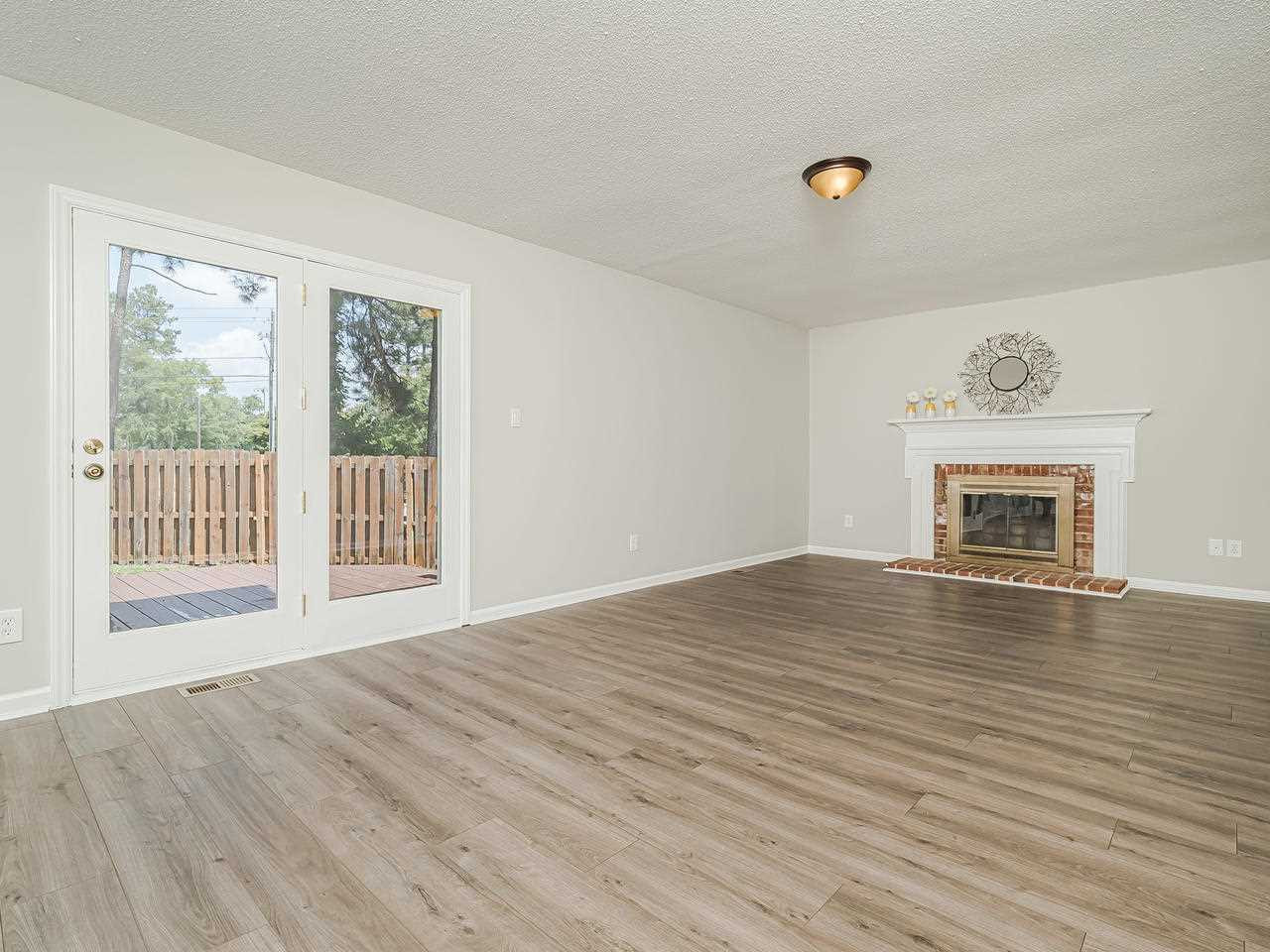 1901 Grove Point Court Raleigh, NC 27609 - Photo 11 of 26 Family Room with Fireplace