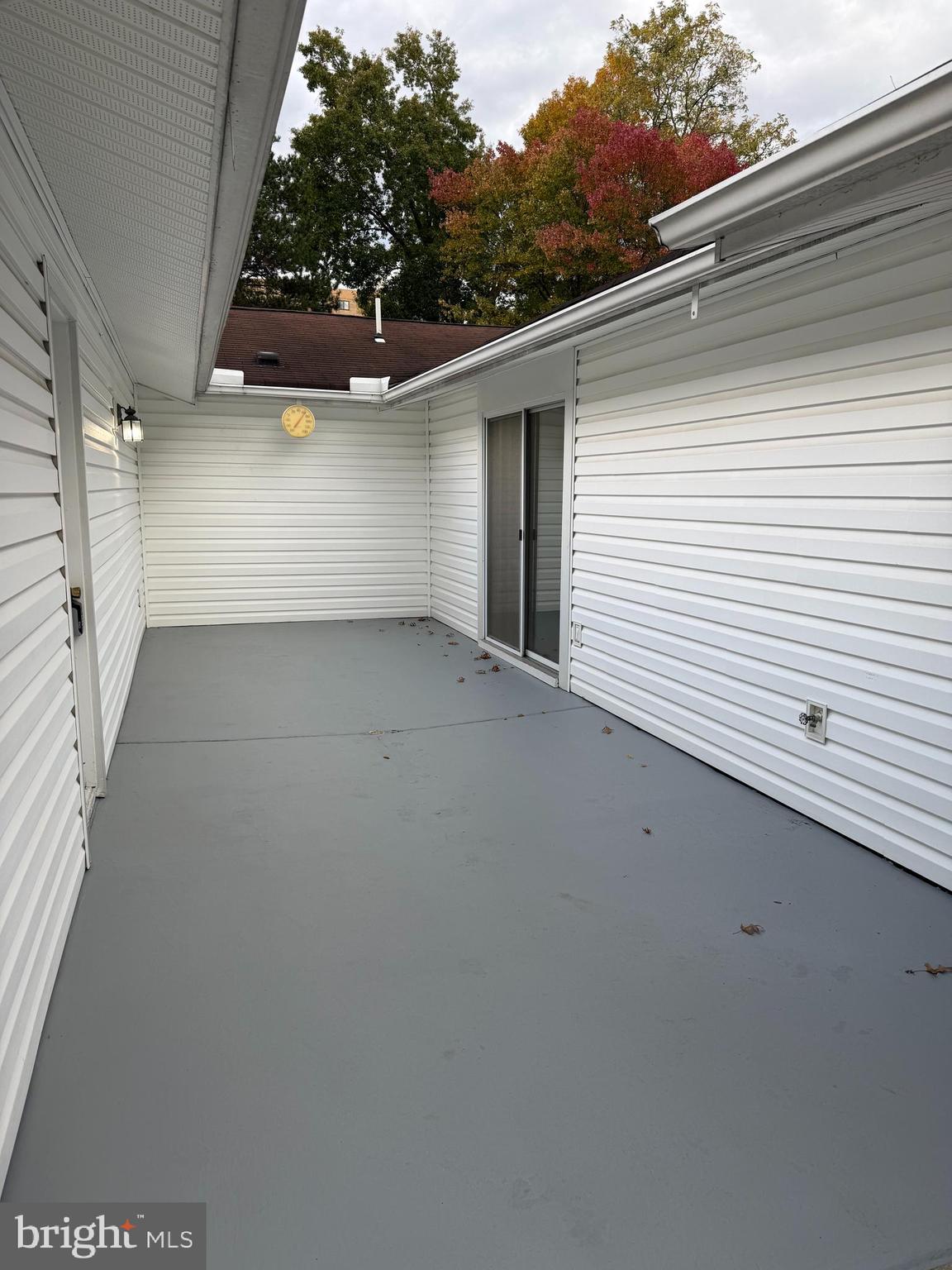 15418 Bramblewood Drive, Unit 20C Silver Spring, MD 20906 - Photo 16 of 18 a view of a house with a garage