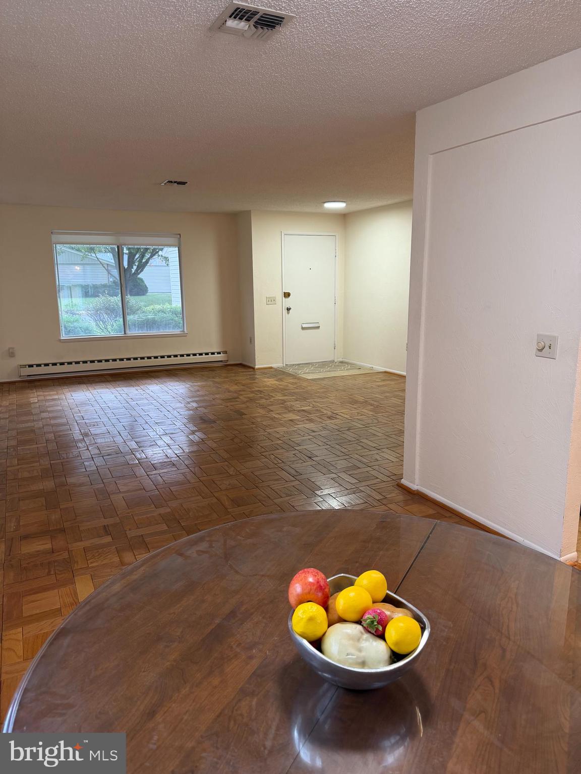 15418 Bramblewood Drive, Unit 20C Silver Spring, MD 20906 - Photo 2 of 18 a view of an empty room with a window