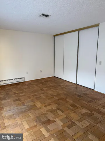 a view of a room with an empty space