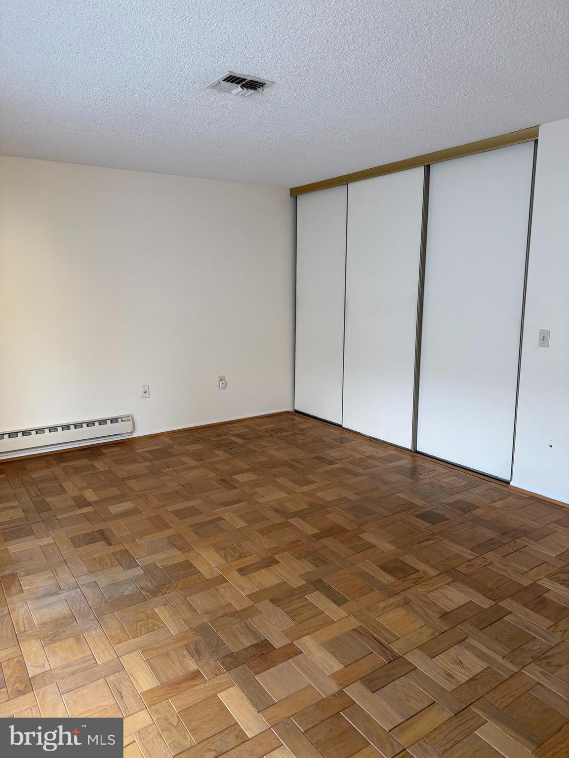 15418 Bramblewood Drive, Unit 20C Silver Spring, MD 20906 - Photo 8 of 18 a view of a room with an empty space