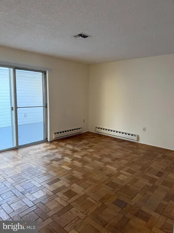an empty room with natural light