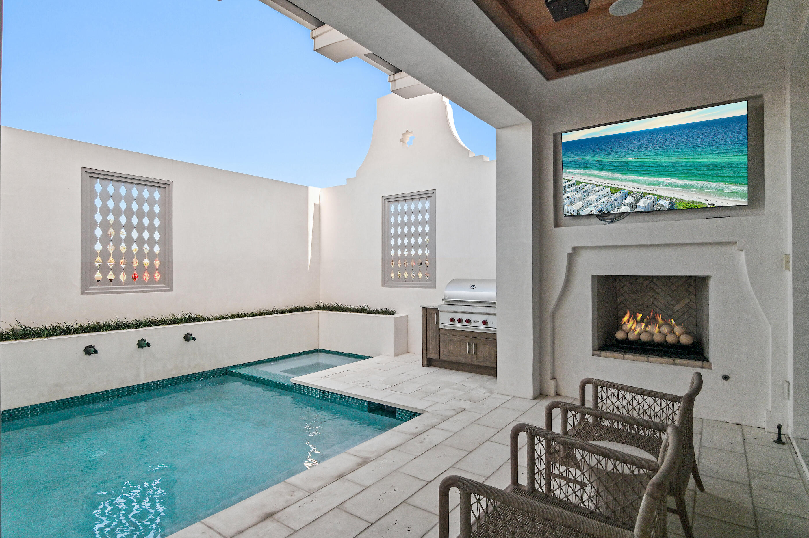 155 Elbow Beach Rd Inlet Beach Inlet Beach, FL 32461 - Photo 26 of 49 27 - Courtyard Pool + Fireplace
