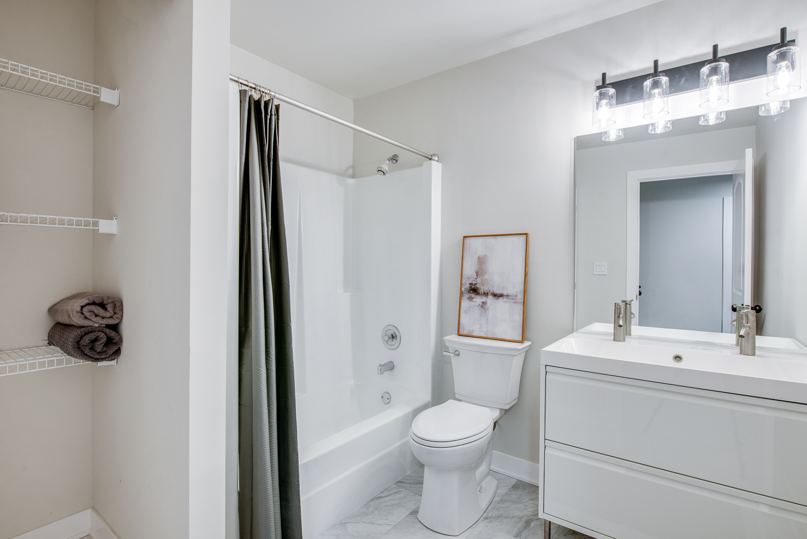 2909 Vimy Ridge Drive Joliet, IL 60435 - Photo 17 of 22 a bathroom with a toilet a sink and shower