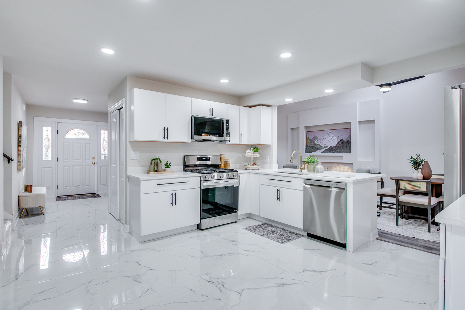 2909 Vimy Ridge Drive Joliet, IL 60435 - Photo 6 of 22 a kitchen with white cabinets and appliances