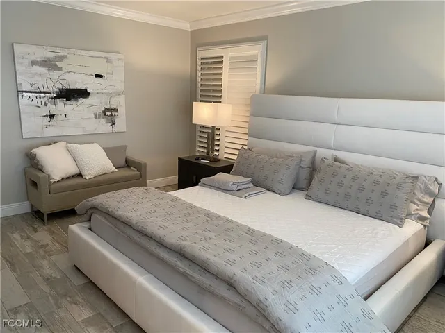 a bedroom with furniture and a couch