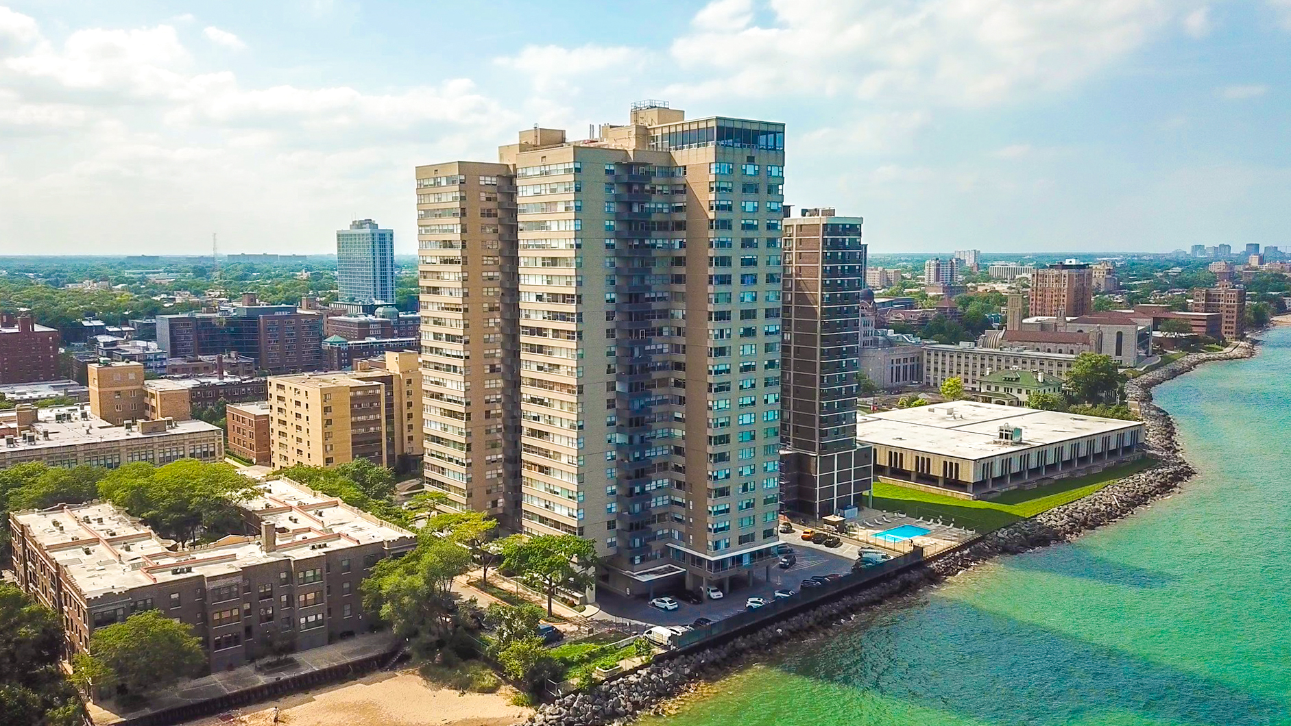 6301 North Sheridan Road, Unit 24E Chicago, IL 60660 - Photo 2 of 57 a city view with tall buildings