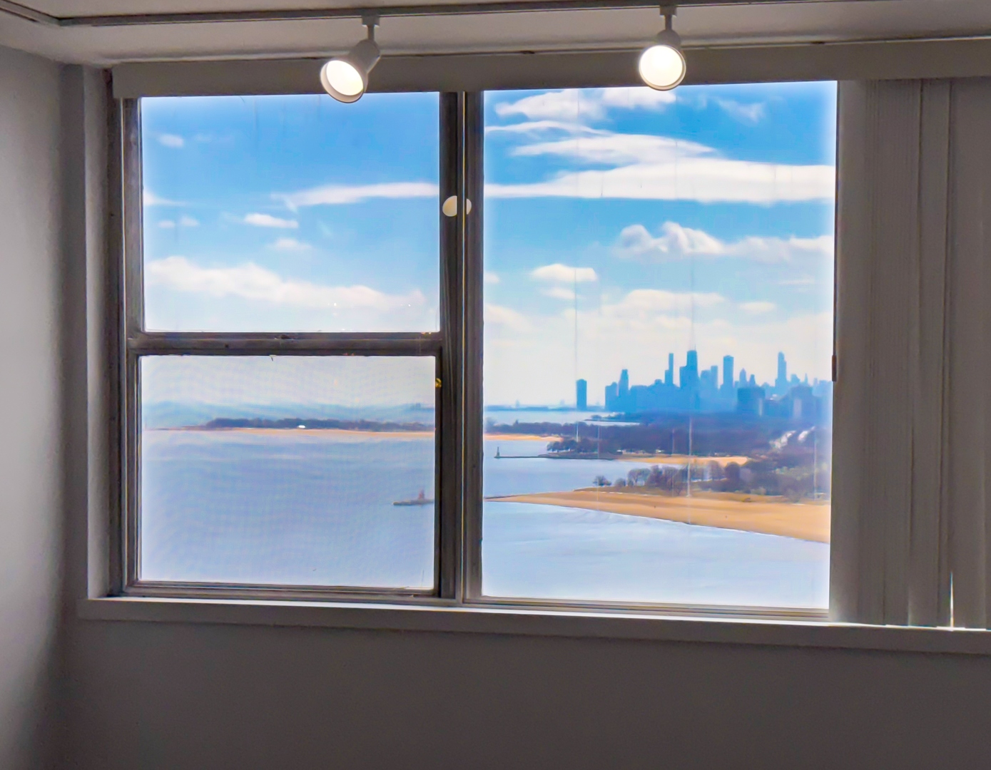 6301 North Sheridan Road, Unit 24E Chicago, IL 60660 - Photo 4 of 57 a view of a glass door