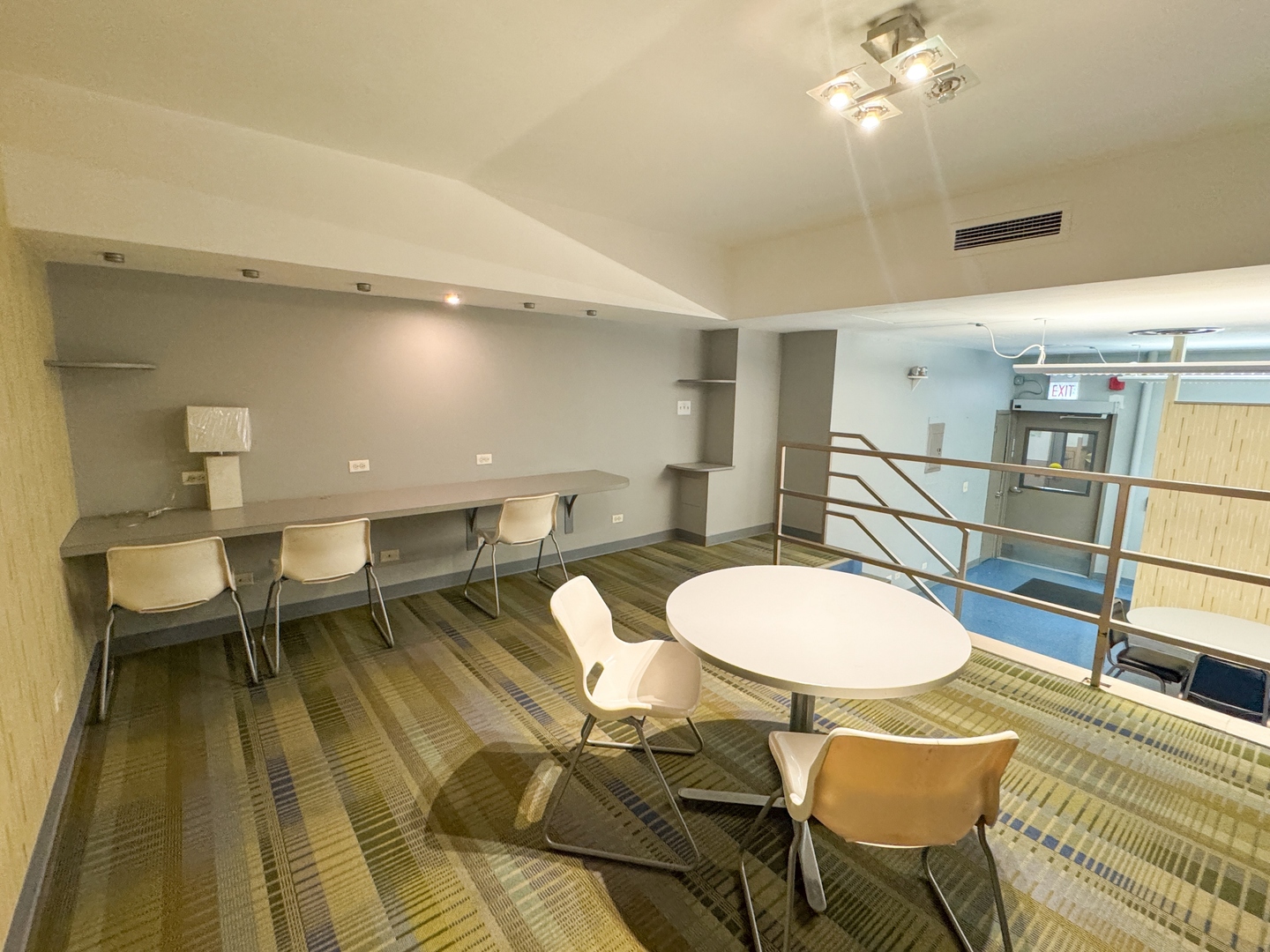 6301 North Sheridan Road, Unit 24E Chicago, IL 60660 - Photo 49 of 57 a dining room with furniture and wooden floor