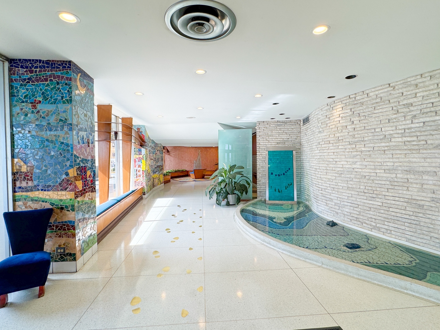 6301 North Sheridan Road, Unit 24E Chicago, IL 60660 - Photo 53 of 57 a view of a entryway door of the building and front view of a building