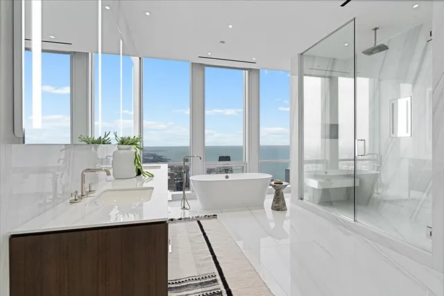 a large kitchen with a large window and sink