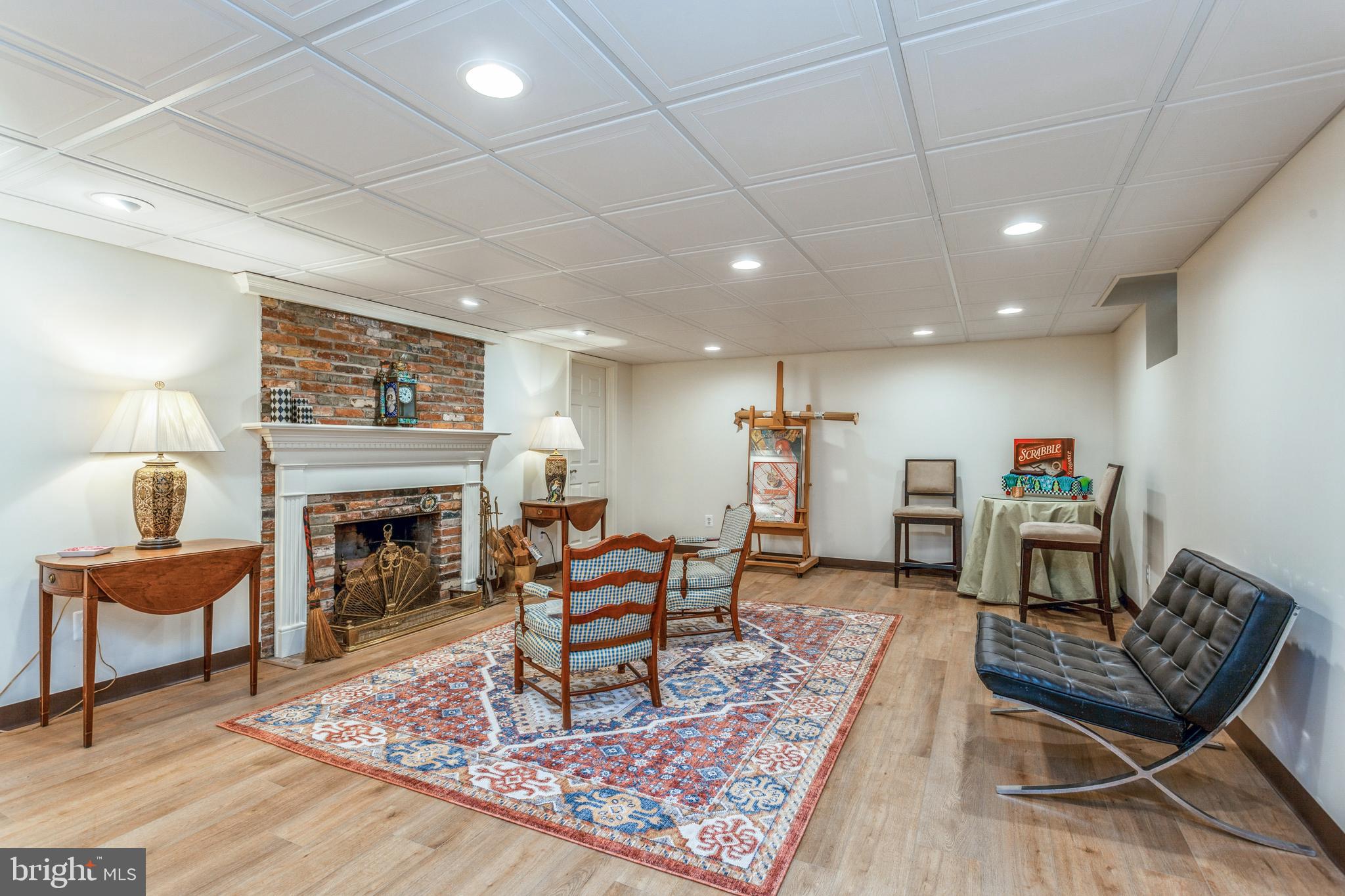 1111 Bellemore Road Baltimore, MD 21210 - Photo 32 of 35 Large, lower level FR with wood-burning fireplace