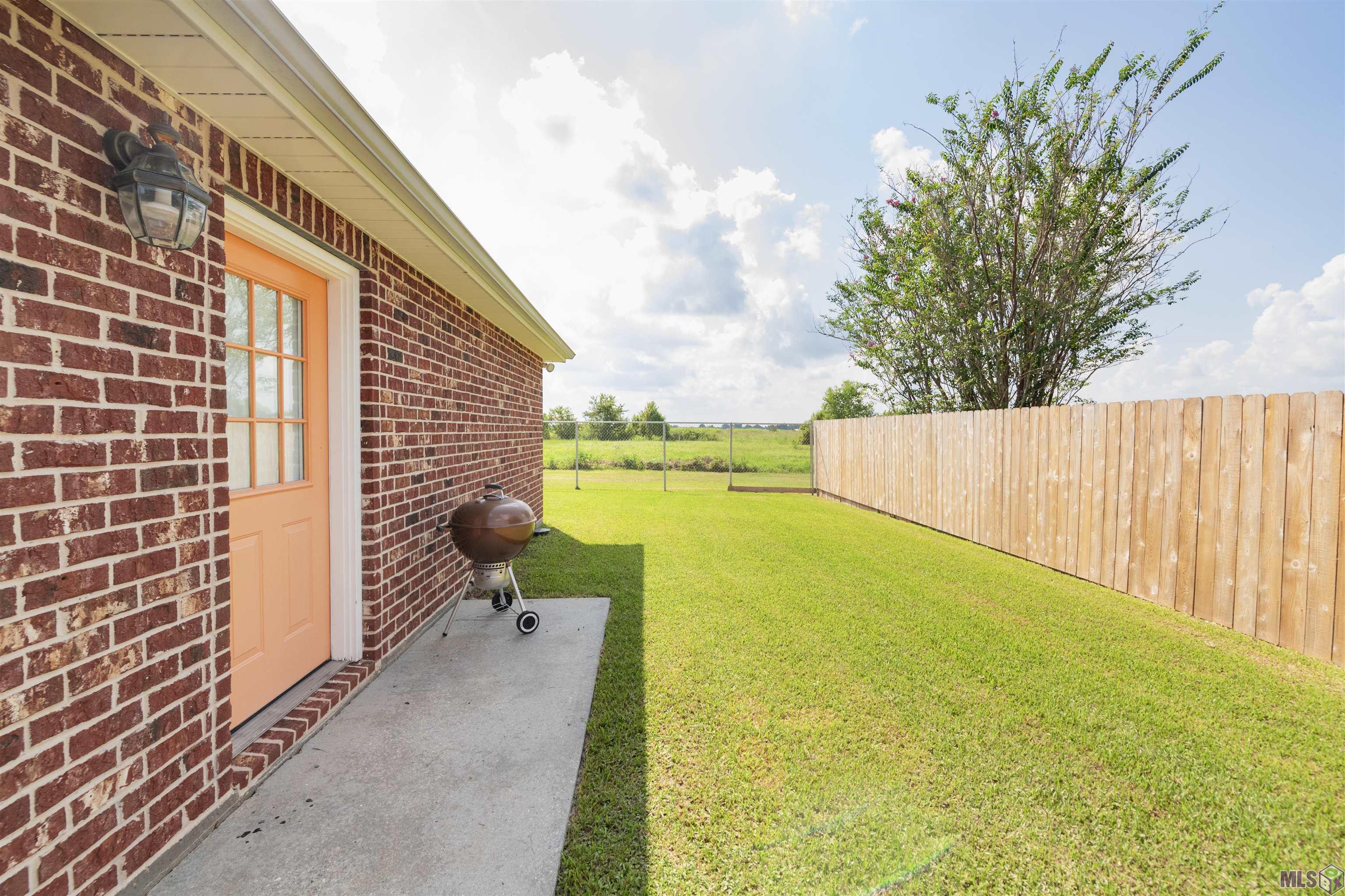 415 St Anthony Street Raceland, LA 70394 - Photo 20 of 25 Side Yard View