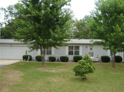 9055 Pheasant Trace W Drive Demotte, IN 46310 - Photo 1 of 1 a front view of house with yard and green space