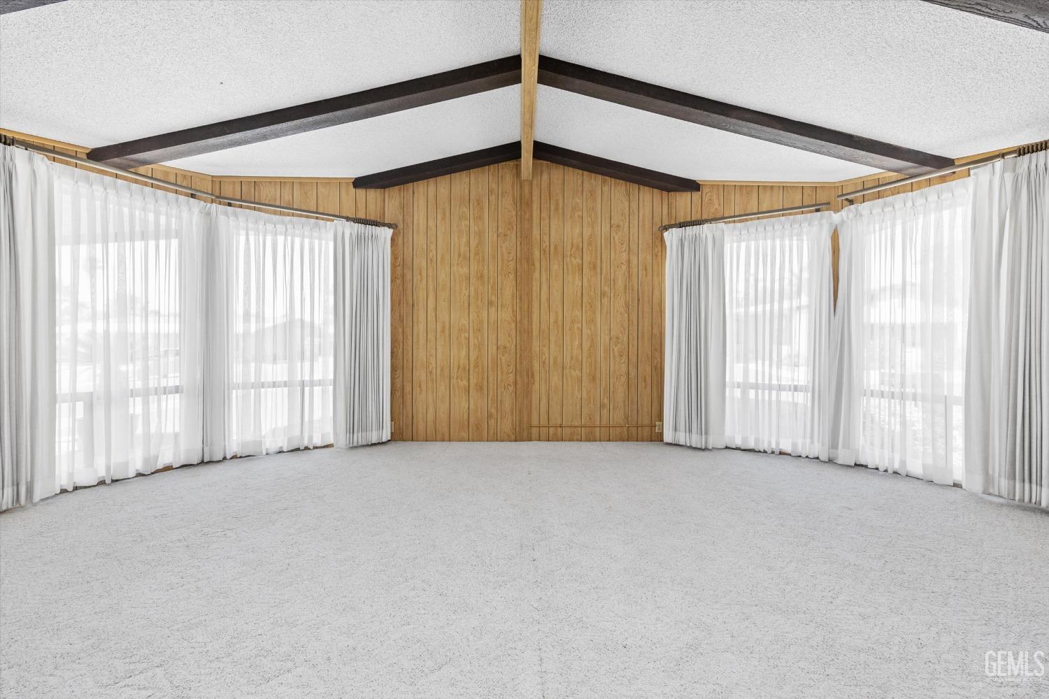 Undisclosed Address Bakersfield, CA 93306 - Photo 12 of 37 an empty room with windows