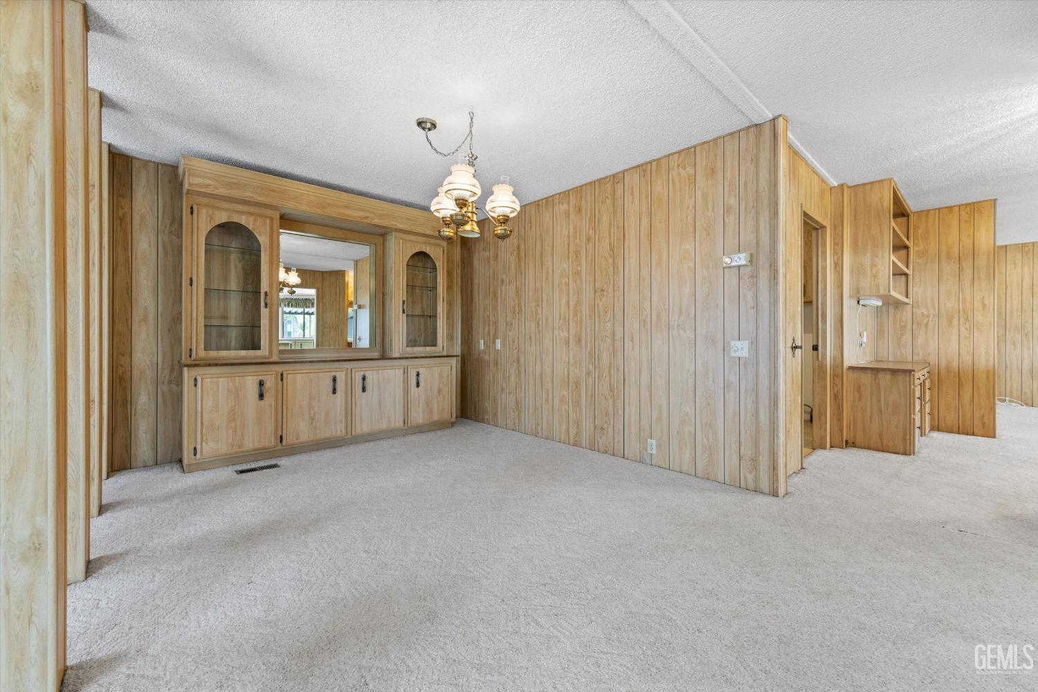 Undisclosed Address Bakersfield, CA 93306 - Photo 14 of 37 an empty room with a bathroom and mirror