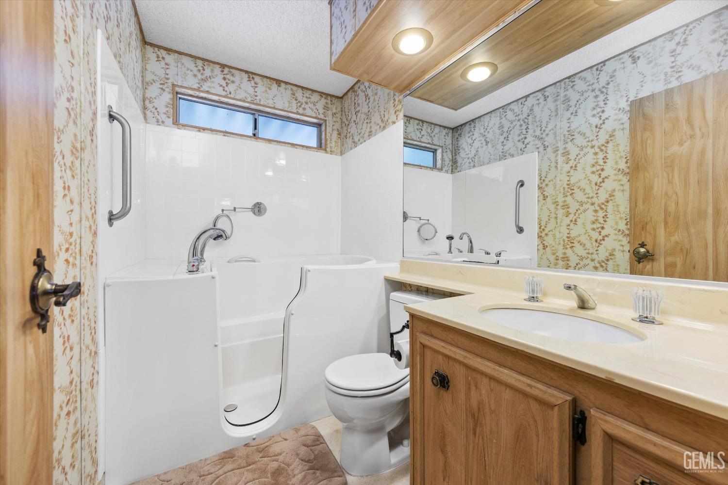 Undisclosed Address Bakersfield, CA 93306 - Photo 28 of 37 a bathroom with a sink a toilet and shower