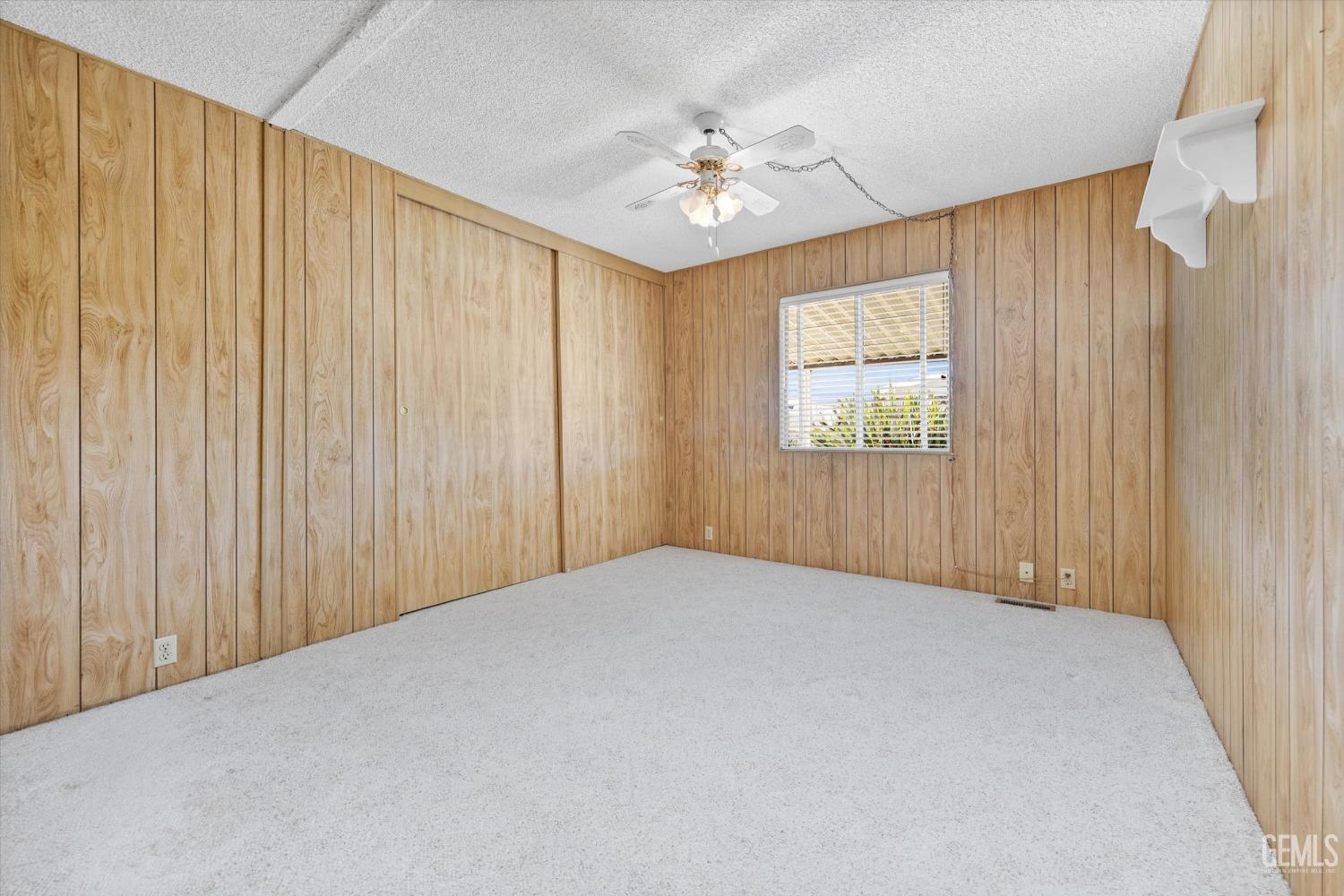 Undisclosed Address Bakersfield, CA 93306 - Photo 29 of 37 a view of an empty room and chandelier fan