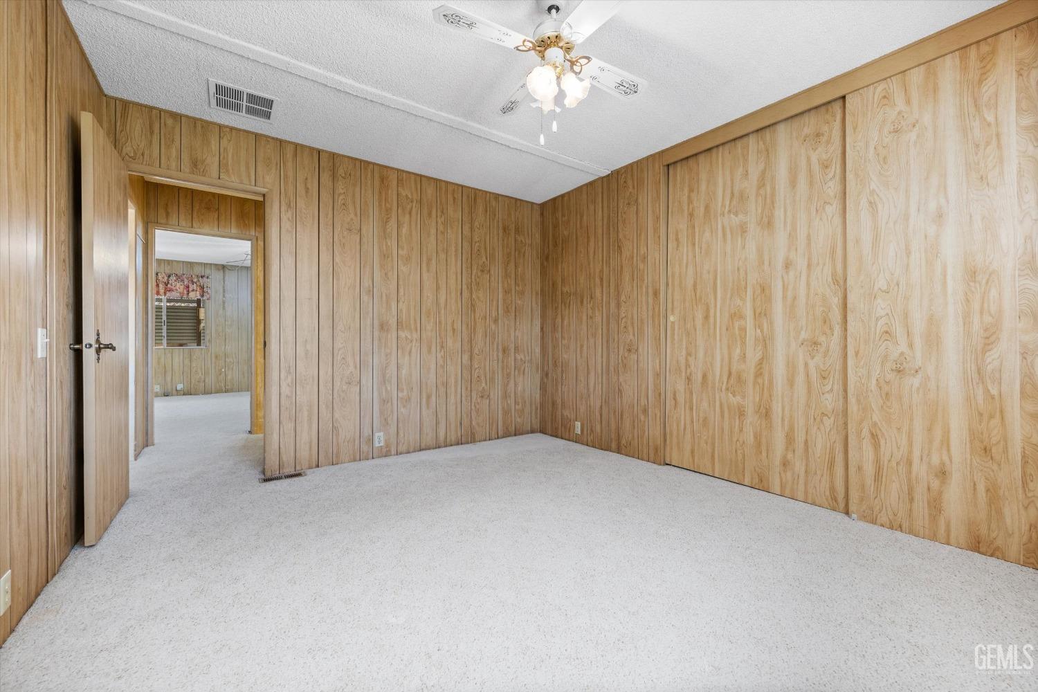 Undisclosed Address Bakersfield, CA 93306 - Photo 30 of 37 a view of a big room with chandelier fan and windows